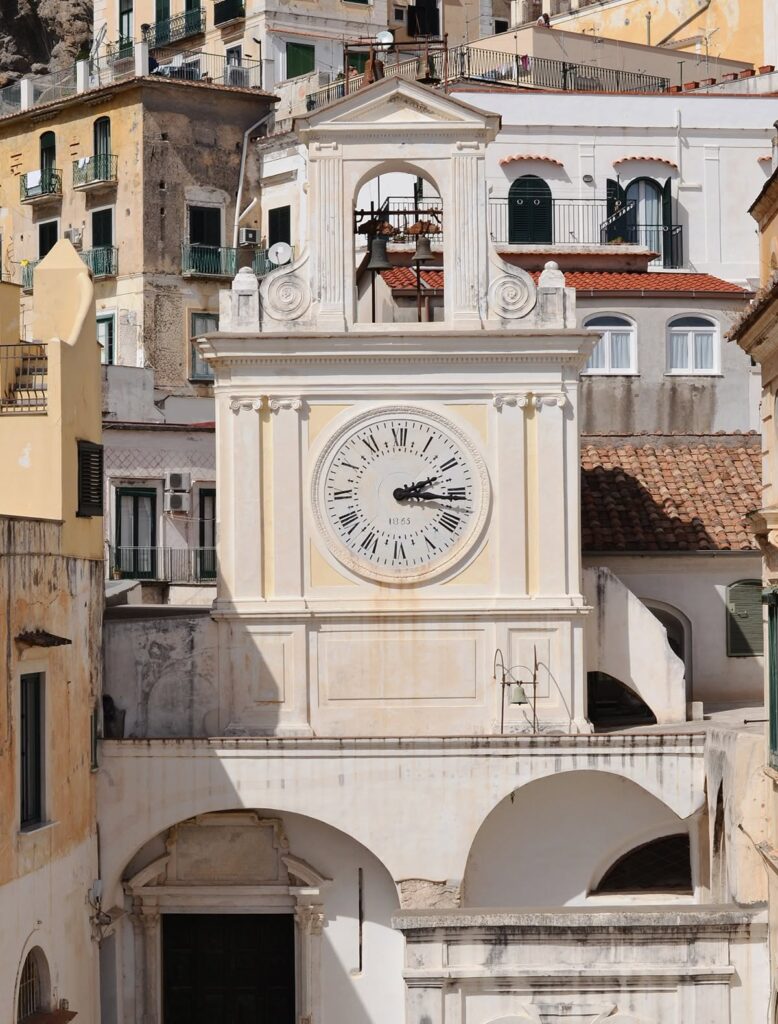 A view of the clock tower in Atrani, Italy near the Amalfi Coast.