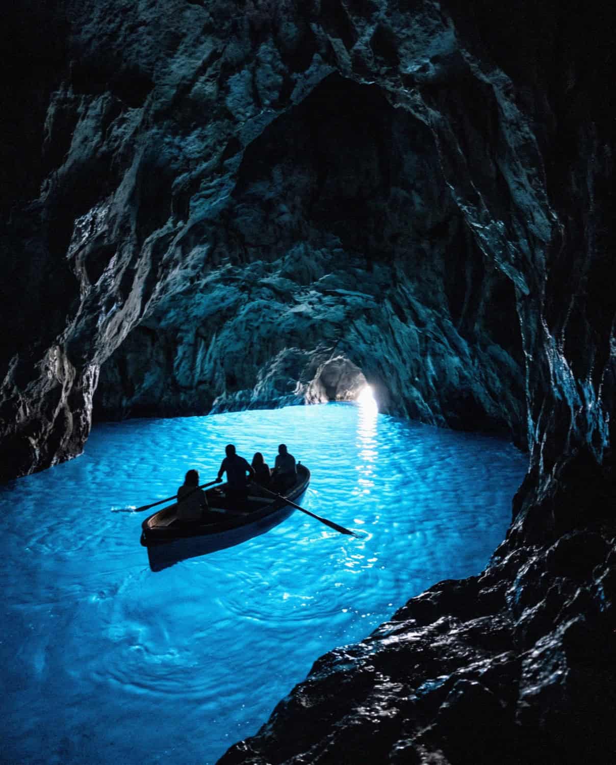 The glowing blue water inside the Blue Grotto of Capri
