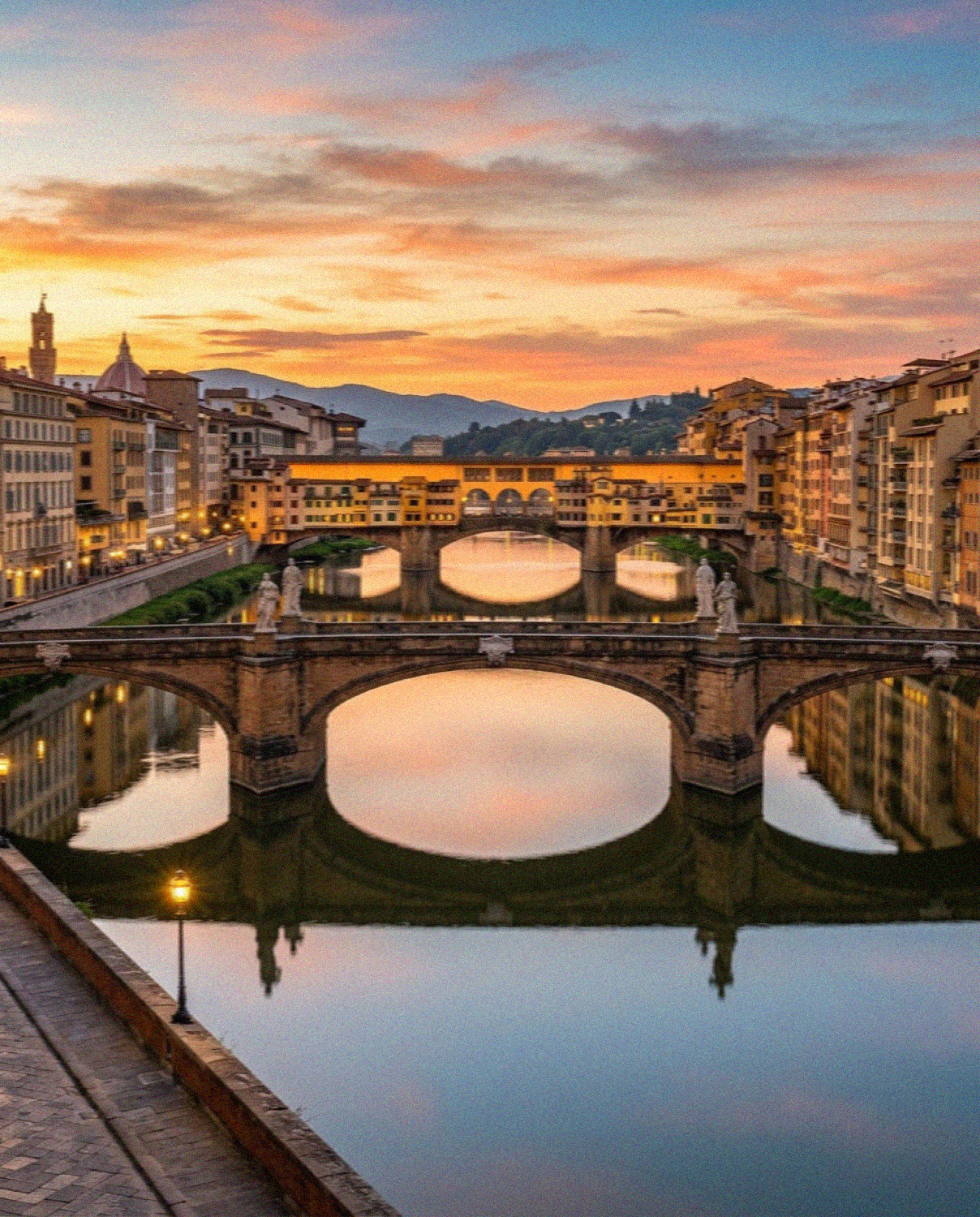 The Ponte Vecchio over the Arno in Florence at sunset