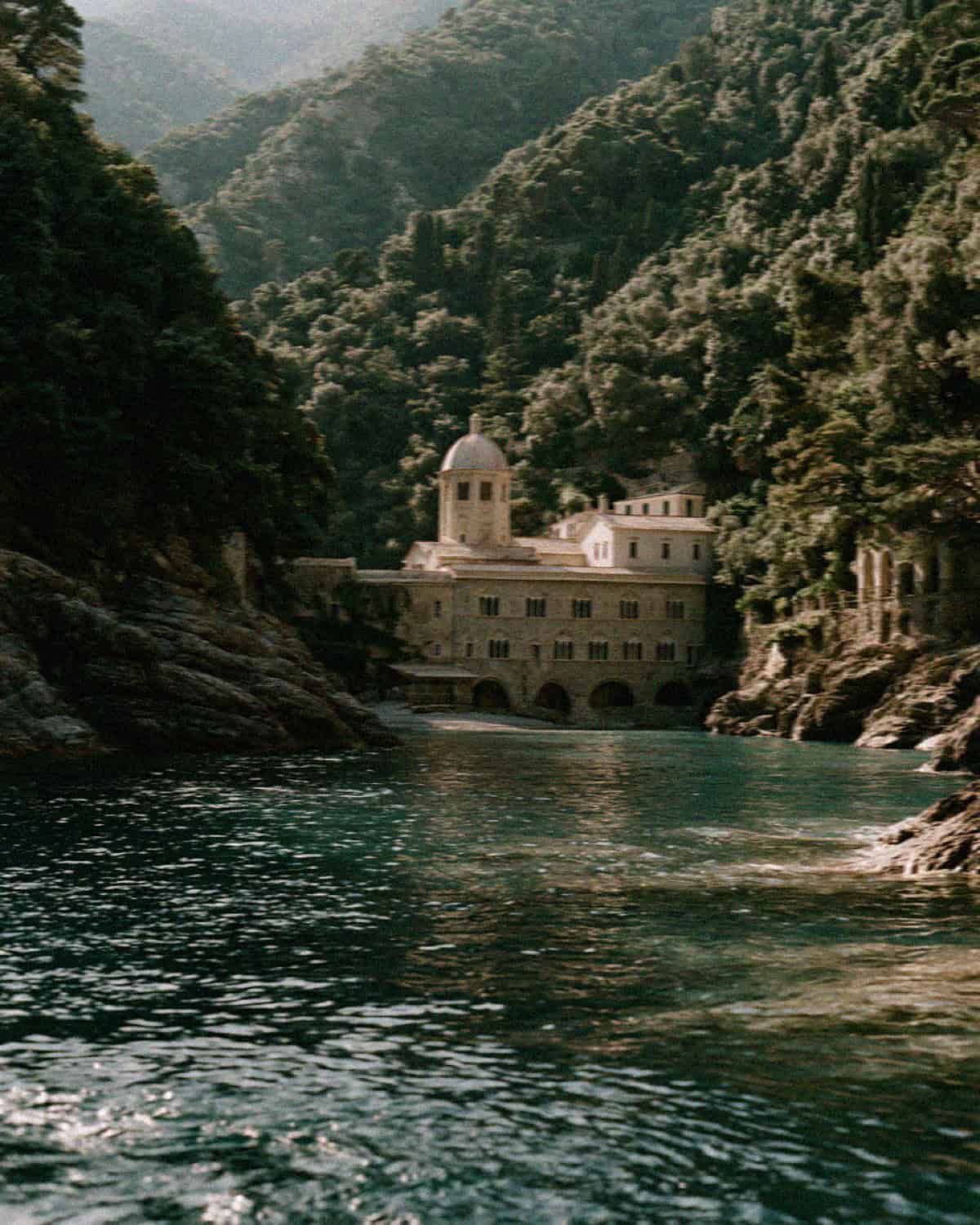 The Benedictine abbey of San Fruttuoso seen from the water in its cove near Portofino