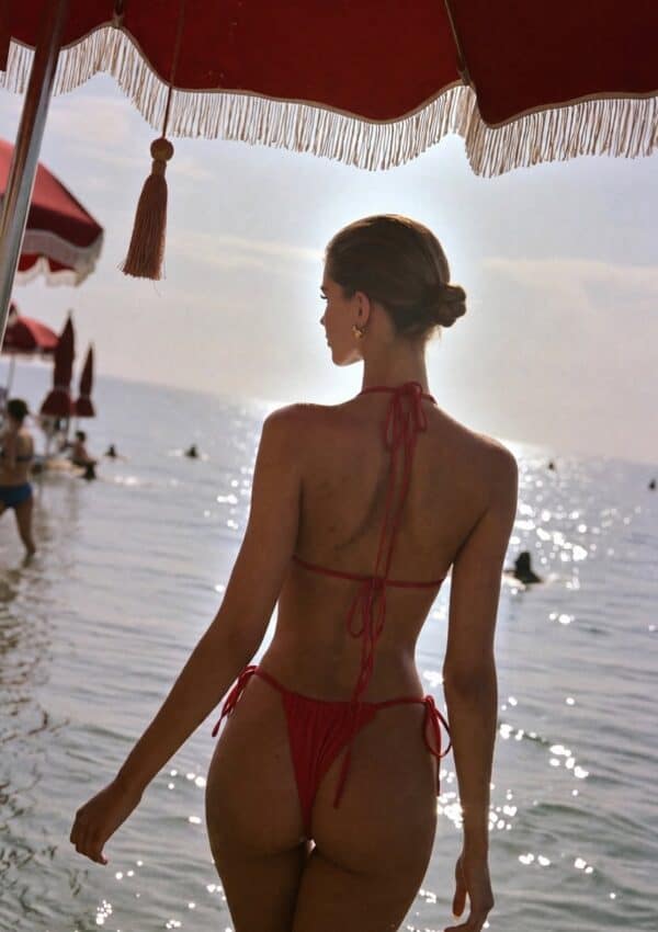Victoria Van Der Berg on a lounger at a Cannes Film Festival beach club