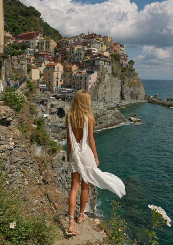 Victoria Van Der Berg at a viewpoint over a Cinque Terre village