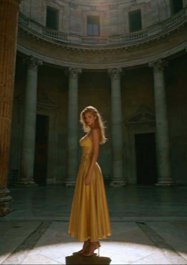 Victoria van der Berg in a beam of light beneath a great Roman dome