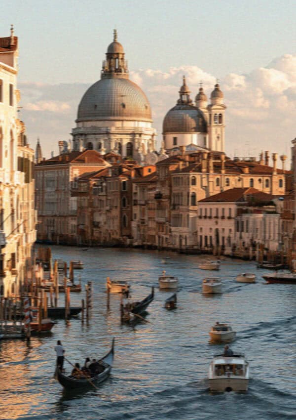 Grand Canal with gondolas and the domes of Santa Maria della Salute in Venice