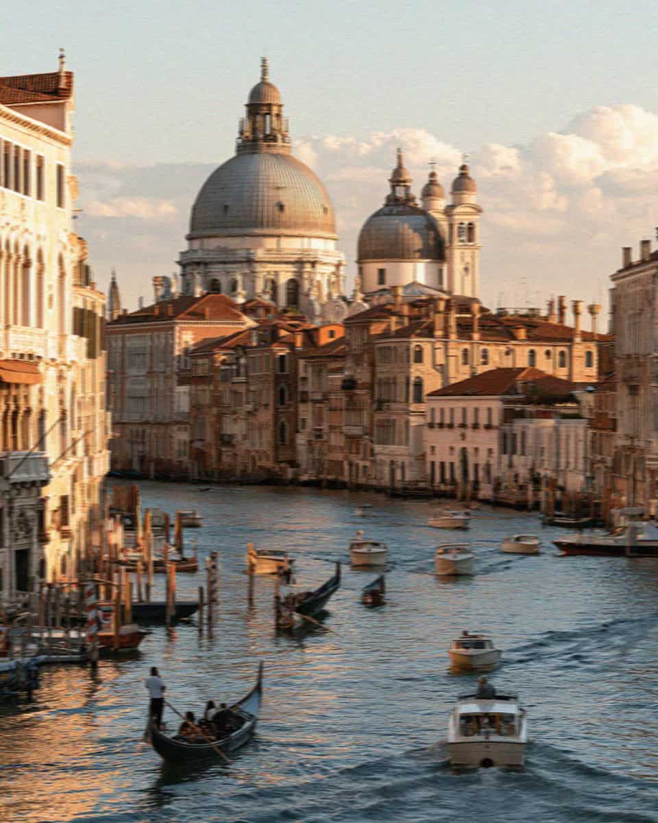 Grand Canal with gondolas and the domes of Santa Maria della Salute in Venice