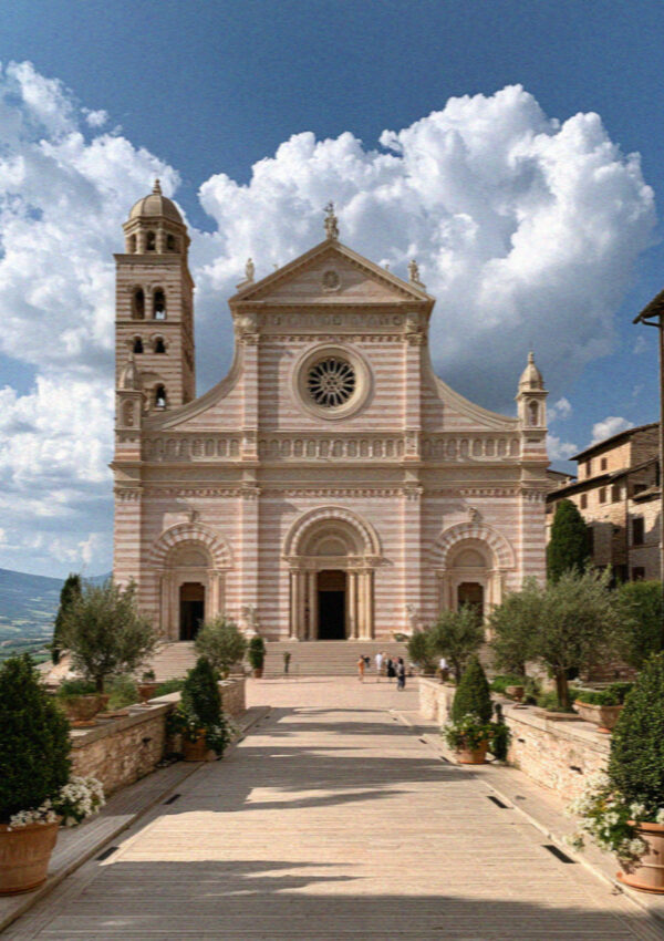 The Basilica of Santa Chiara in Assisi, its pink and white striped facade and rose window