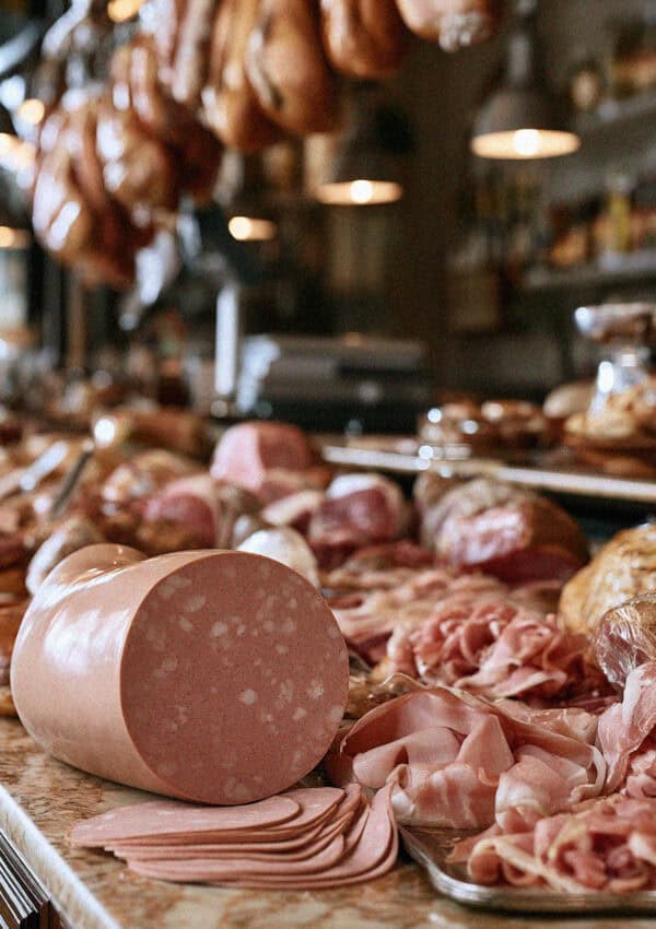 Mortadella at a Bologna salumeria