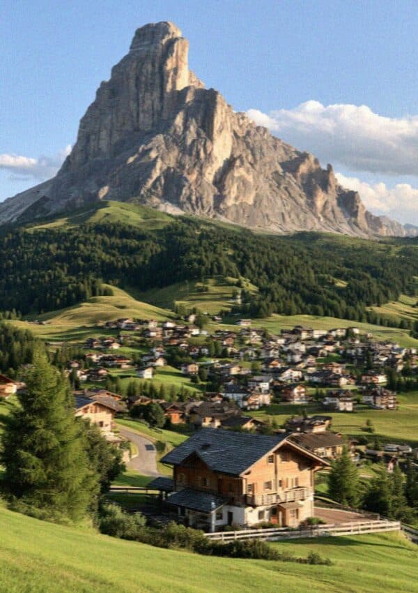 The village of Corvara beneath the Sassongher peak in Alta Badia, Dolomites