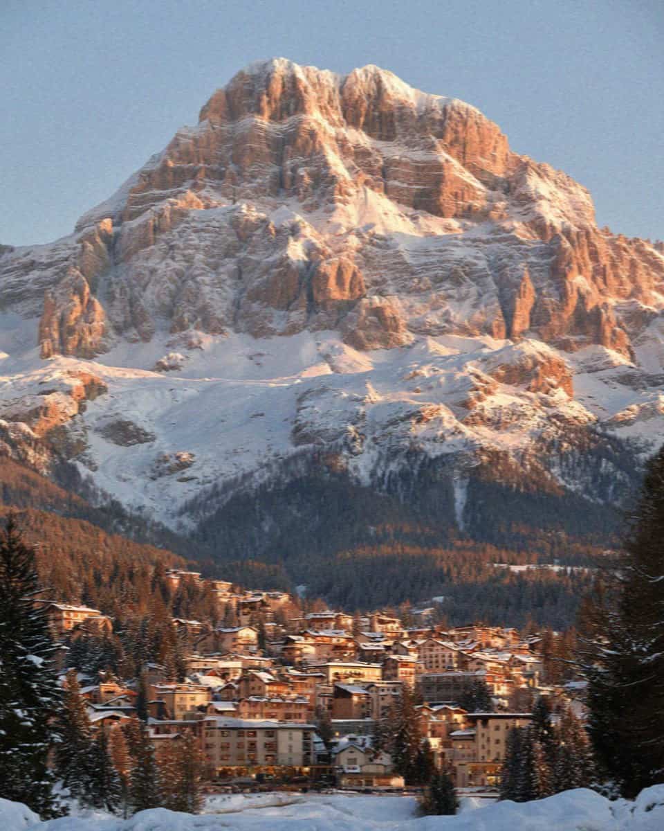 The Tofane peaks glowing above Cortina d'Ampezzo at sunset, Dolomites