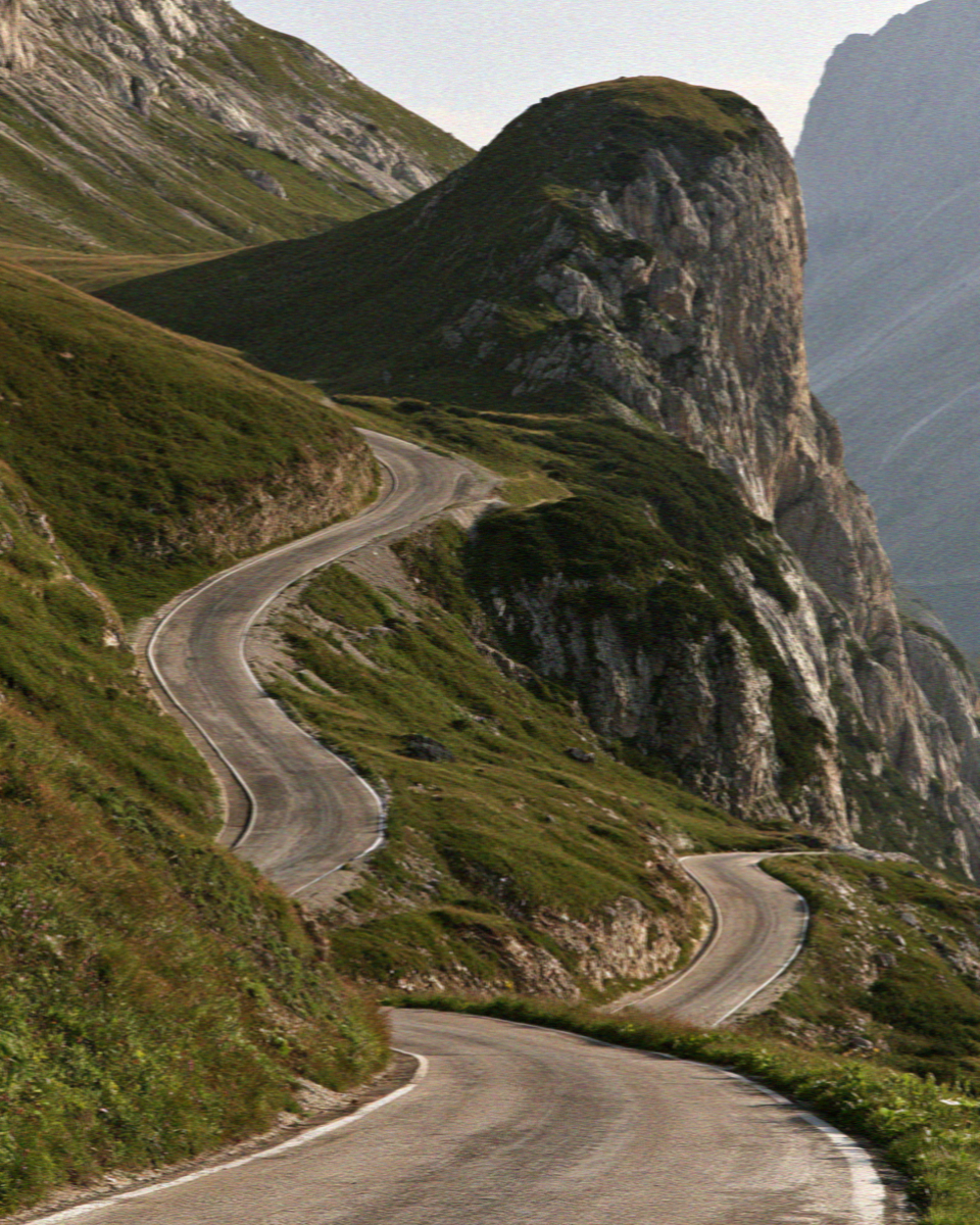 The hairpin bends of a high pass road in the Dolomites