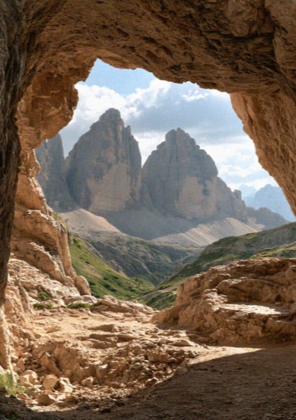 A rock window in the WWI galleries of Mount Lagazuoi framing the Dolomite peaks