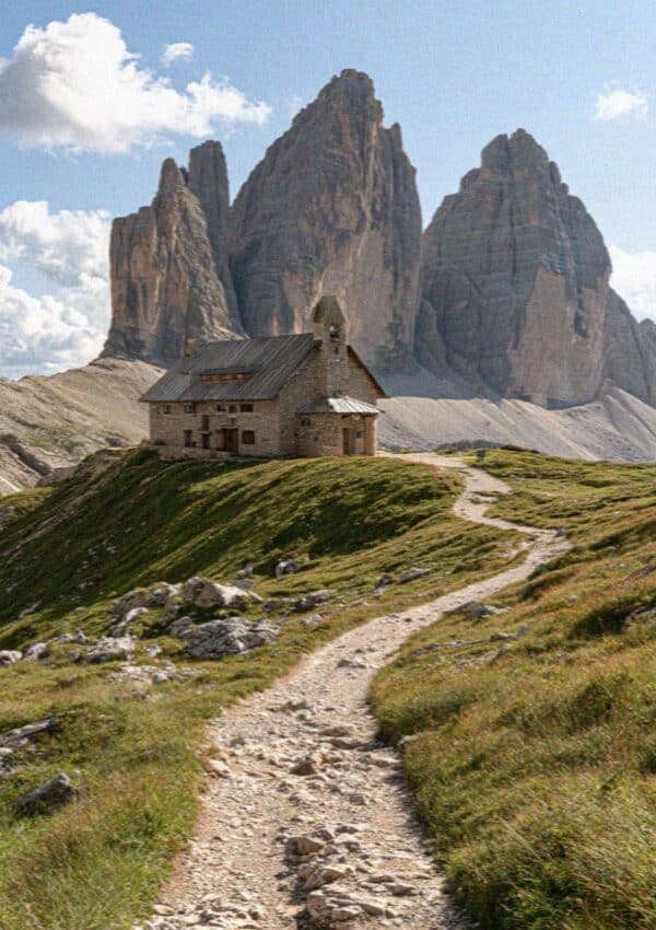 Rifugio Locatelli and its chapel below the three north faces of the Tre Cime di Lavaredo, Dolomites
