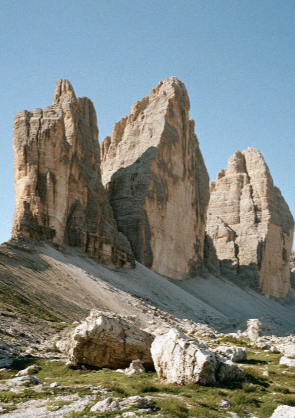 The Tre Cime di Lavaredo under a blue sky in the Dolomites