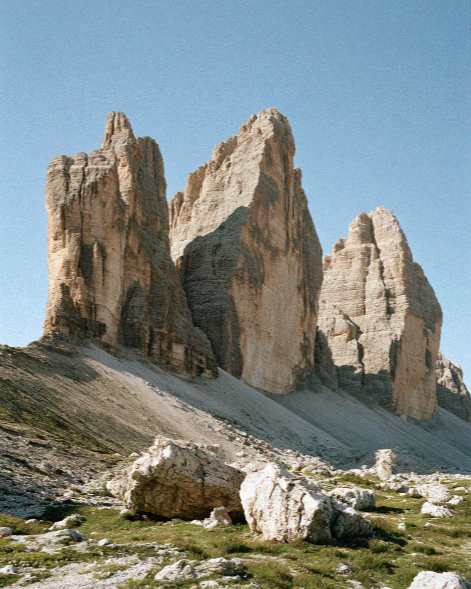 The Tre Cime di Lavaredo under a blue sky in the Dolomites