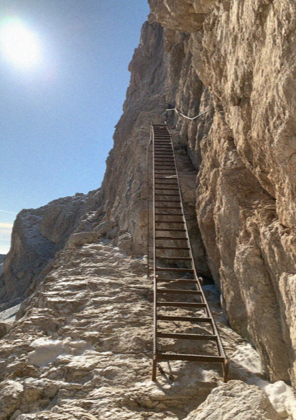 A via ferrata iron ladder bolted to rock in the Dolomites