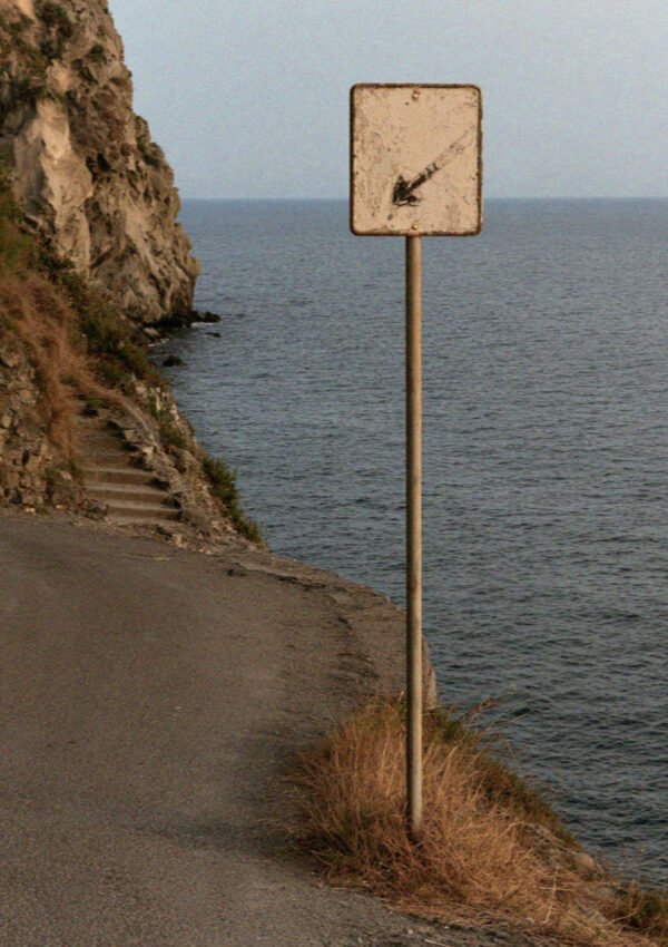 The sign where the road ends above the cove at Sorgeto on Ischia