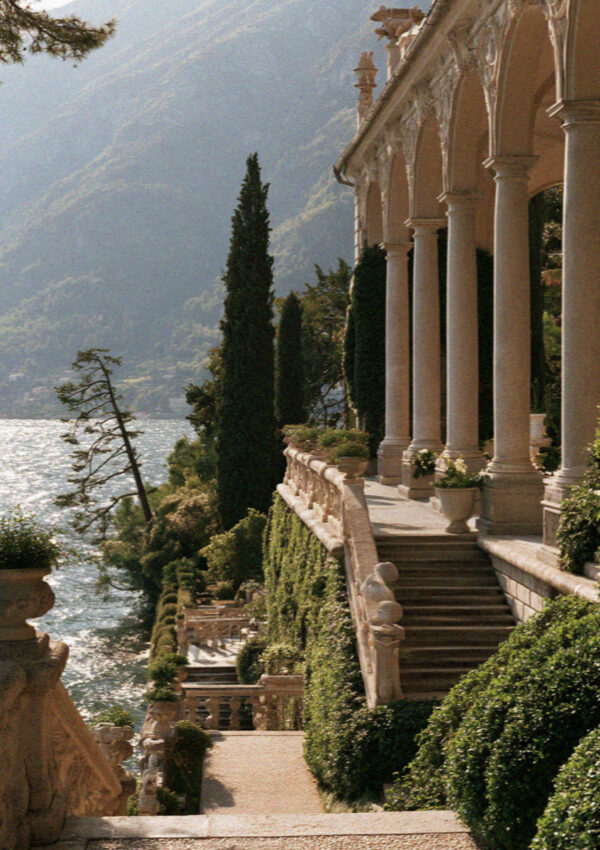 A tiered stone loggia standing above the water on Lake Como