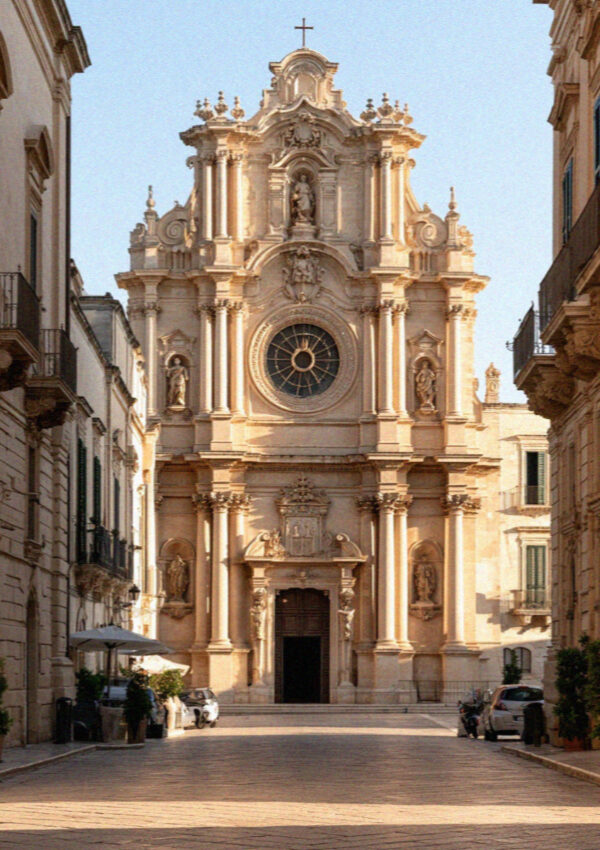 The full height of an ornate baroque church facade in Lecce
