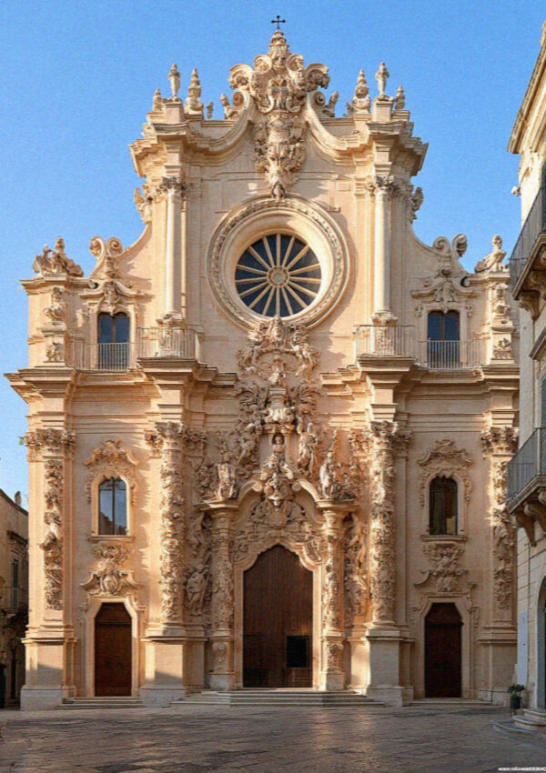 A carved baroque church facade with a rose window in Lecce