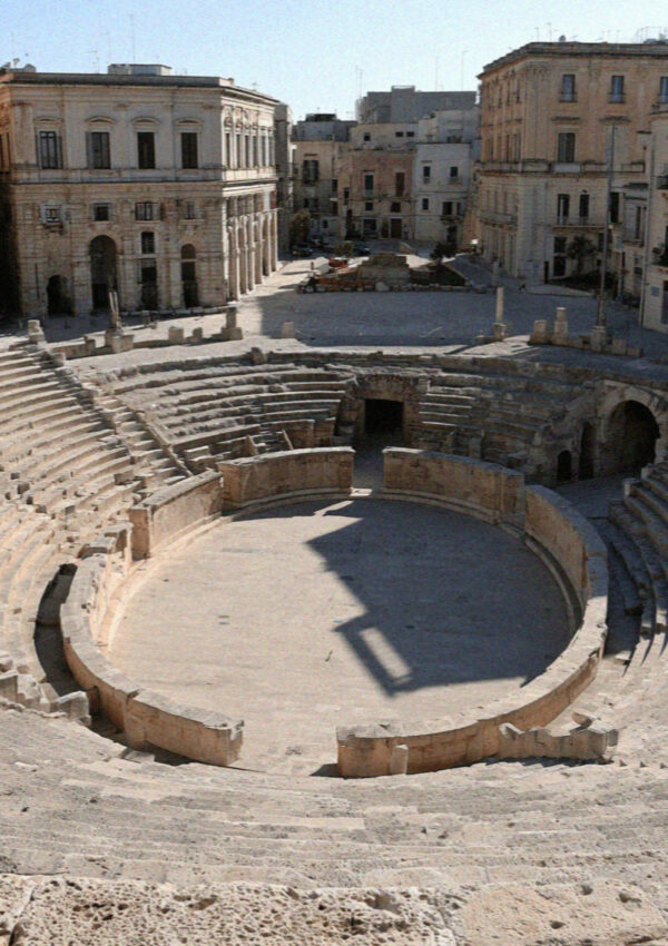 The sunken Roman amphitheatre below street level in the main square of Lecce