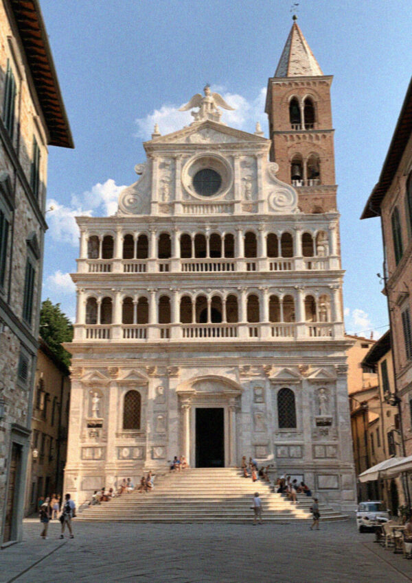 The ornate white marble facade of San Michele in Foro in Lucca