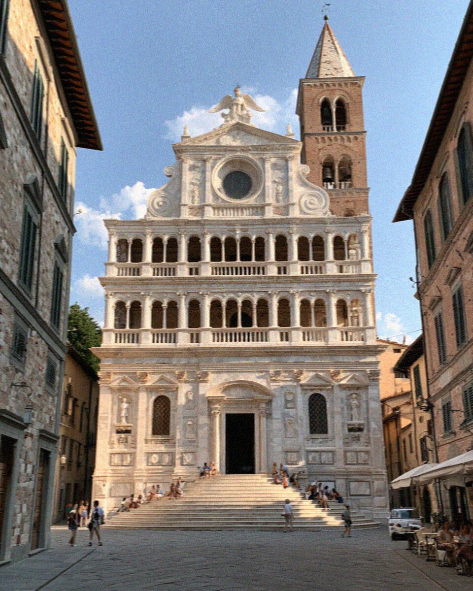 The ornate white marble facade of San Michele in Foro in Lucca