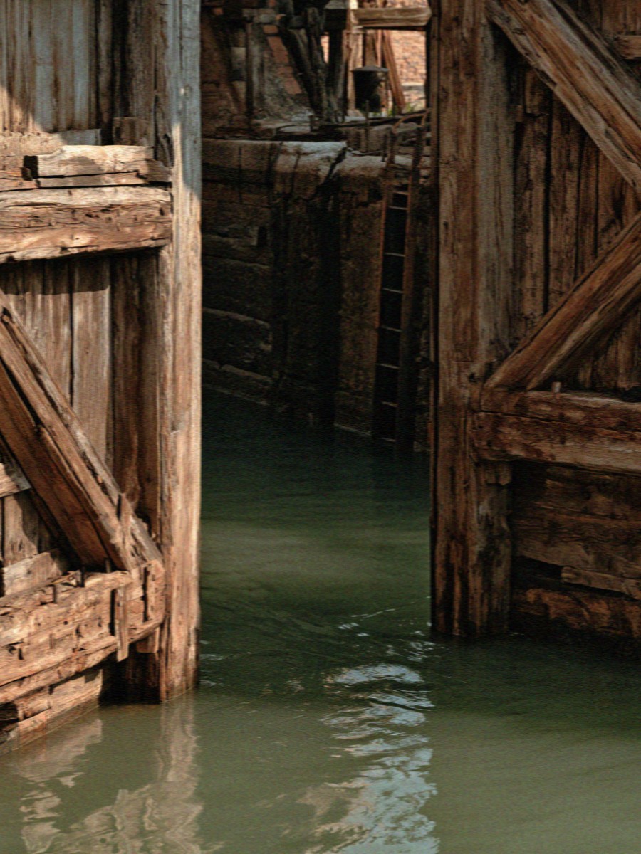 Old wooden lock gates on a Milan canal