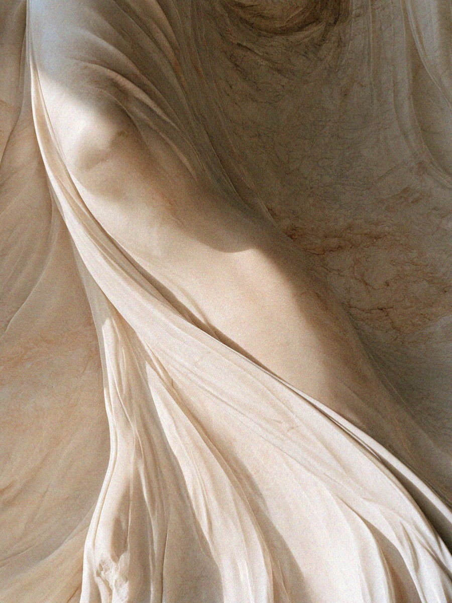 Carved marble drapery on a sculpture in Milan