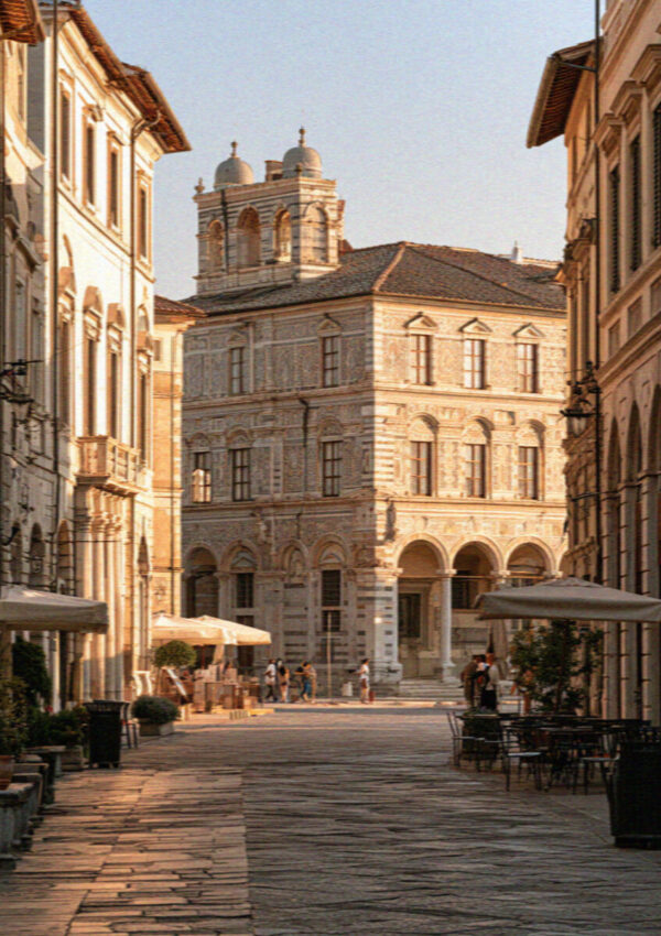 Piazza dei Cavalieri in Pisa with the sgraffito facade of the Palazzo della Carovana