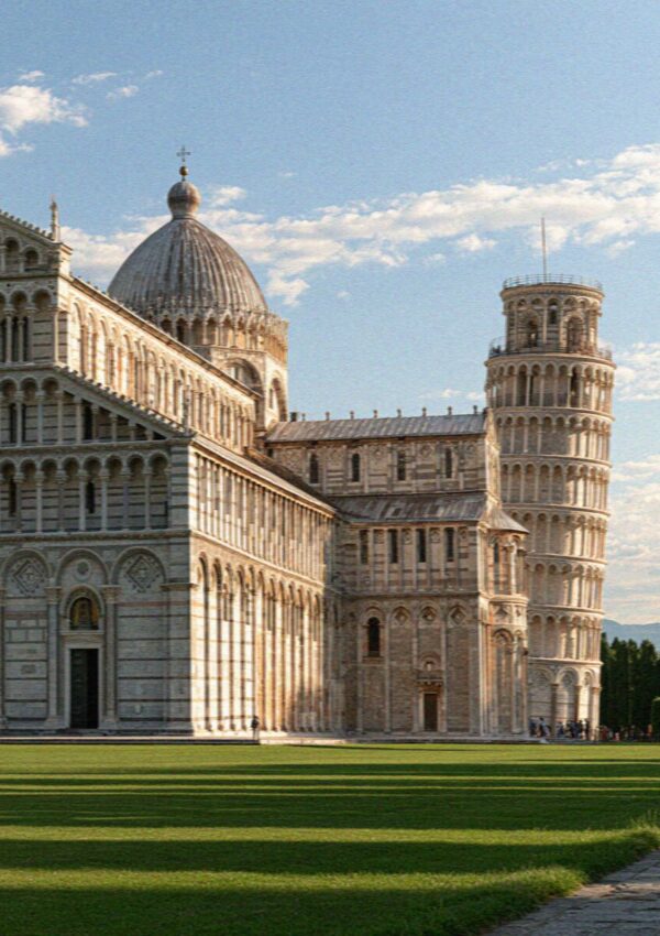 The Cathedral, Baptistery and Leaning Tower on the green lawn of Piazza dei Miracoli in Pisa