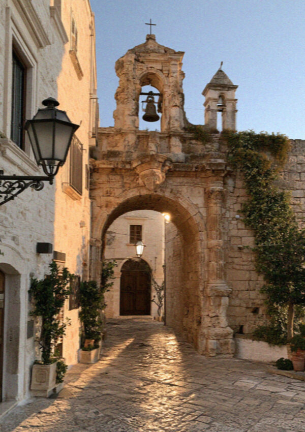 The Arco Marchesale stone gate into the old town, Polignano a Mare