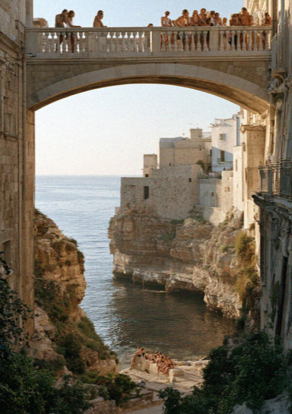 The morning crowd on the old bridge at Polignano a Mare