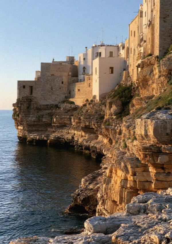 Polignano a Mare at golden hour, the cliff town above the Adriatic