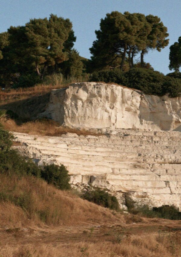 The Greek theatre cut into the rock at the archaeological park in Syracuse