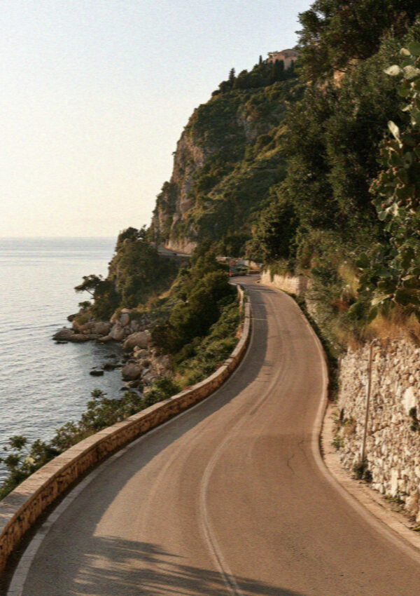 The hairpin road climbing the cliff to Taormina in Sicily