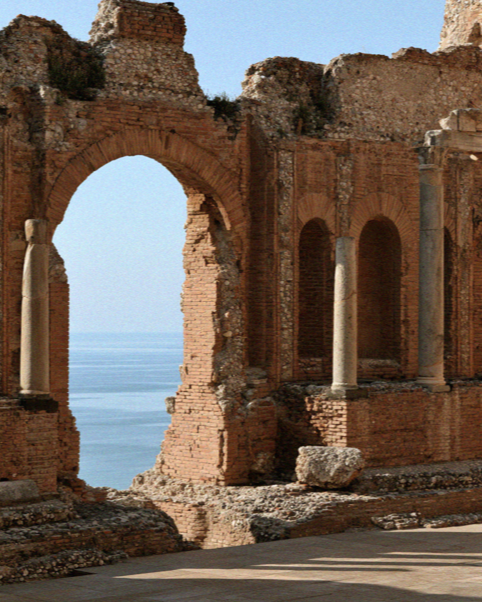 The ruined brick stage wall of the ancient theatre in Taormina