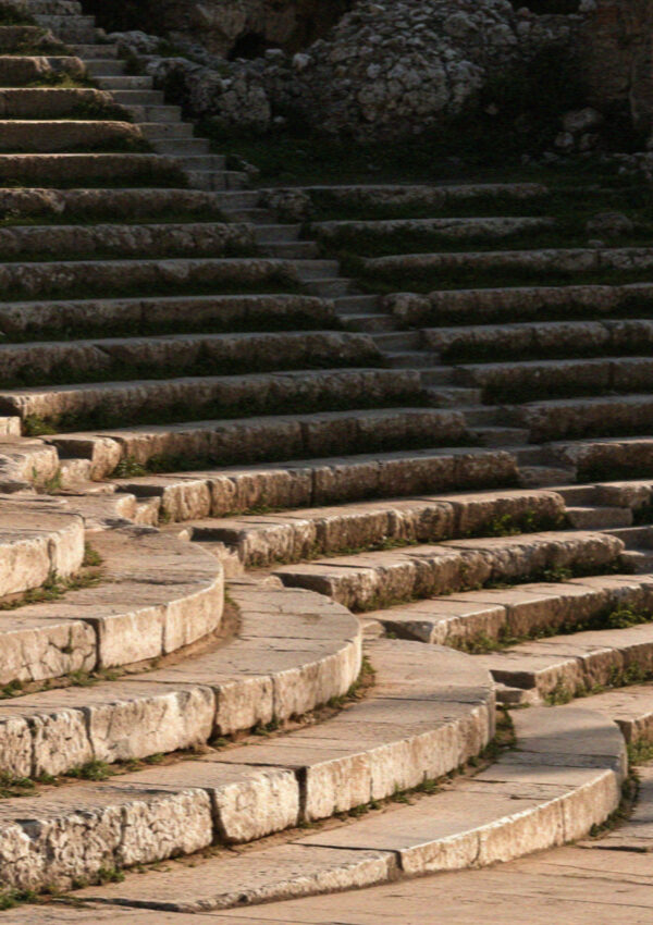 Worn stone seating tiers in the ancient theatre at Taormina