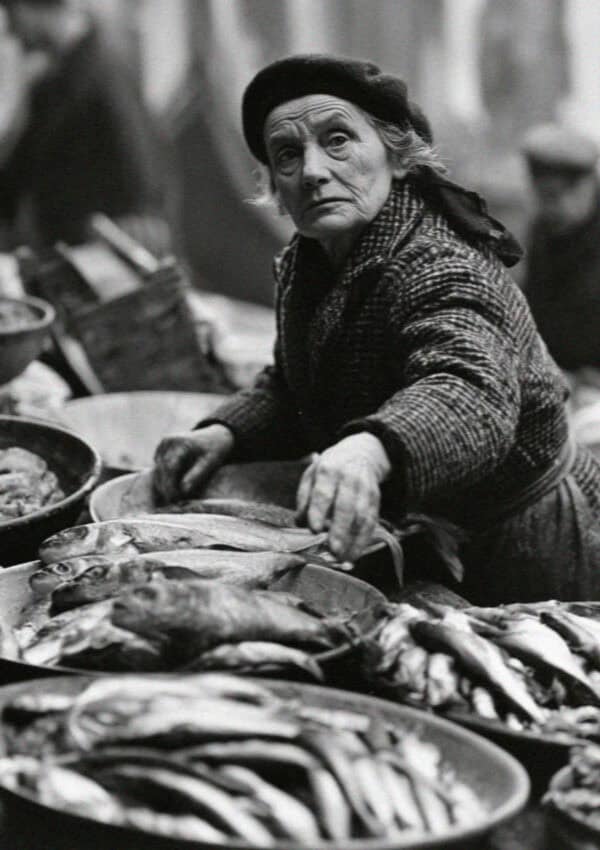 A woman choosing fish at the Rialto market, Venice