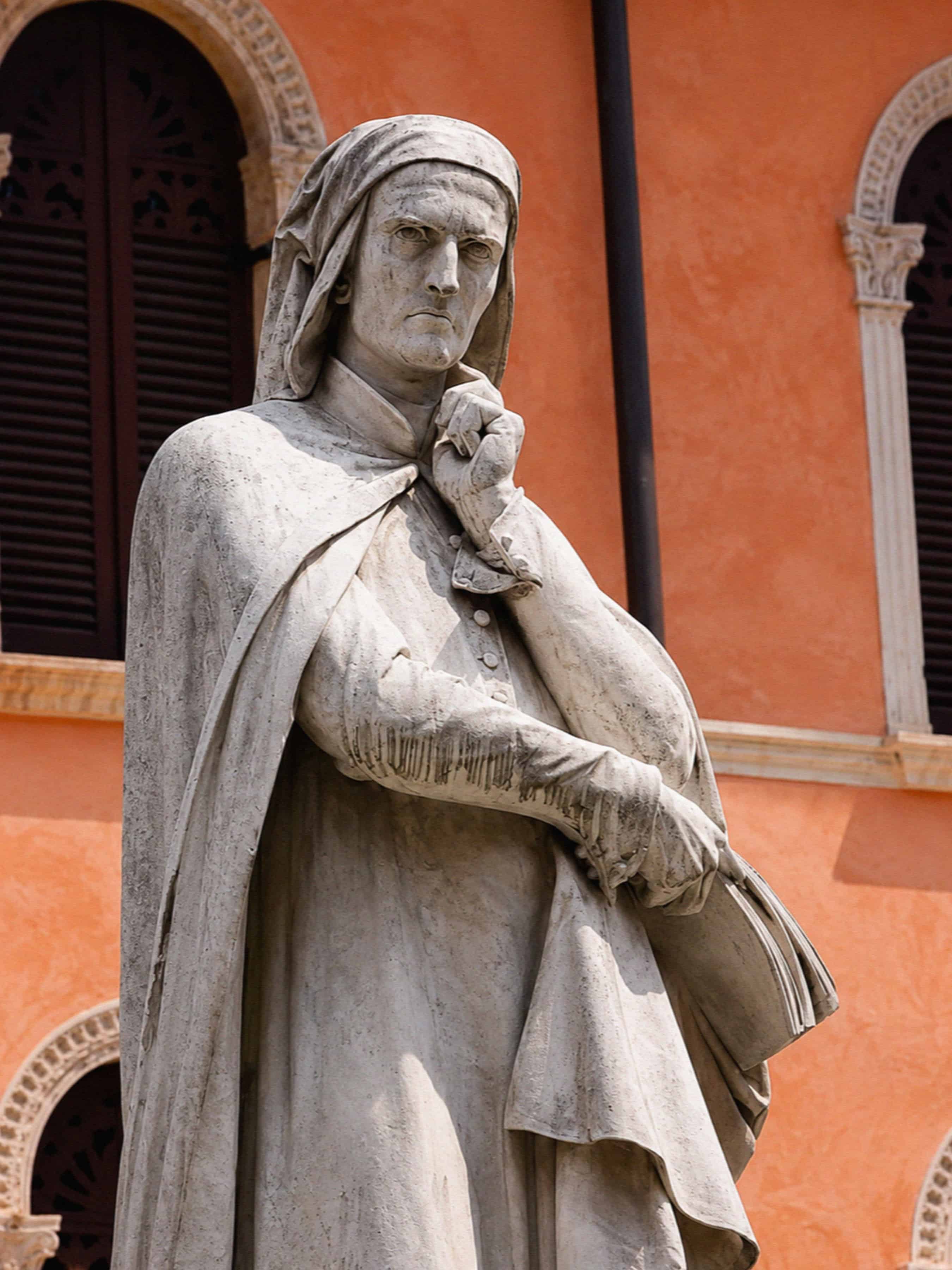 The marble statue of the poet Dante Alighieri in the Piazza dei Signori in Verona