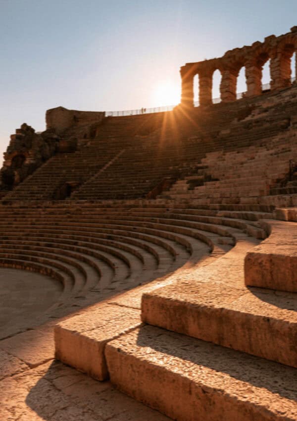 The stone tiers of the Teatro Romano at sunset, Verona