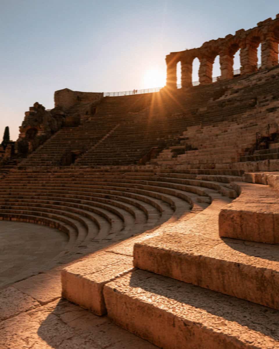 The stone tiers of the Teatro Romano at sunset, Verona