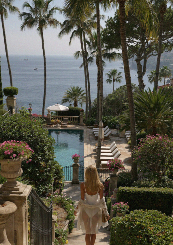 The terraced thermal gardens above the bay on Ischia, palms and pools running down to the sea