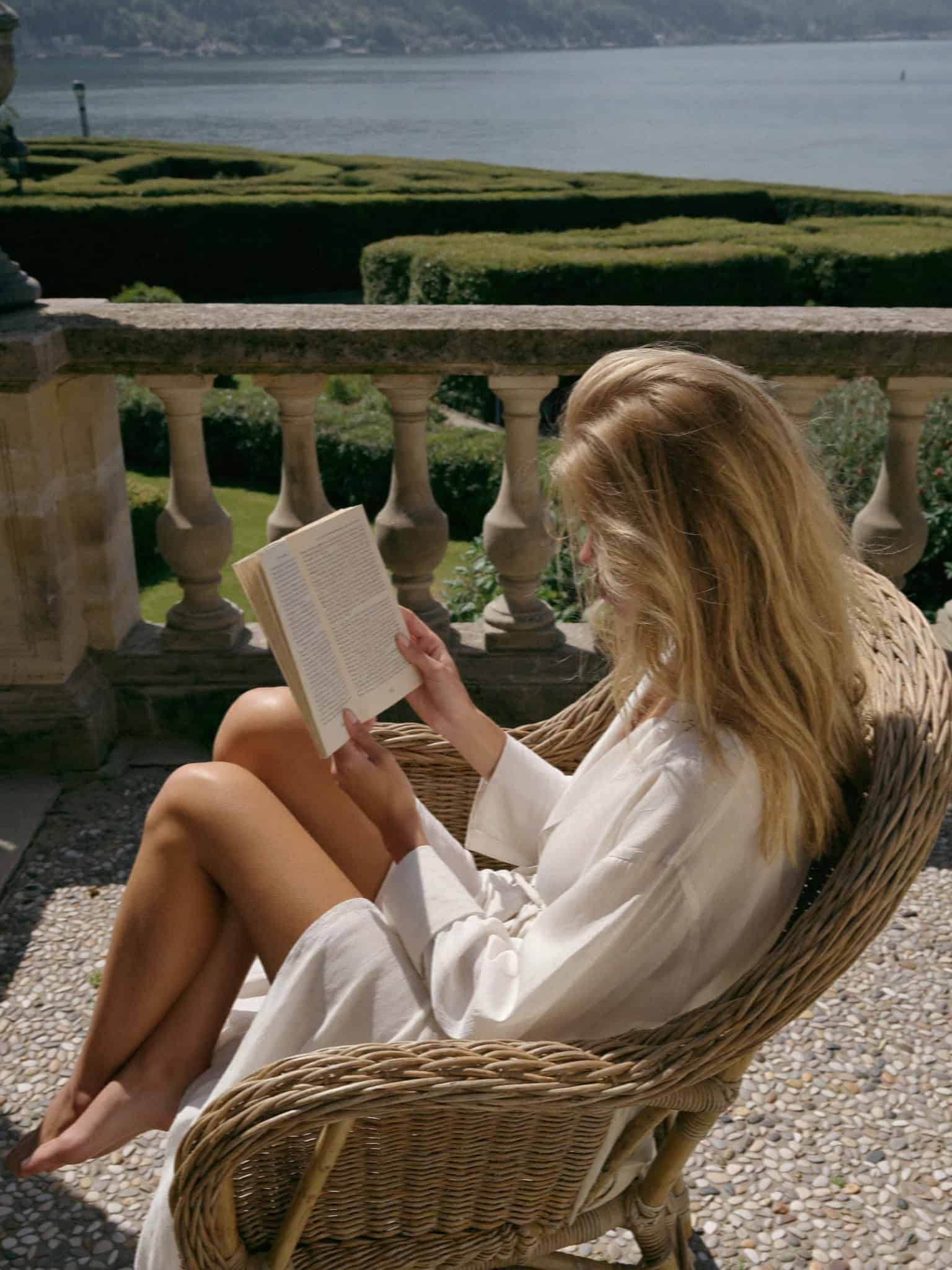 Victoria reading on the hotel terrace over Lake Maggiore