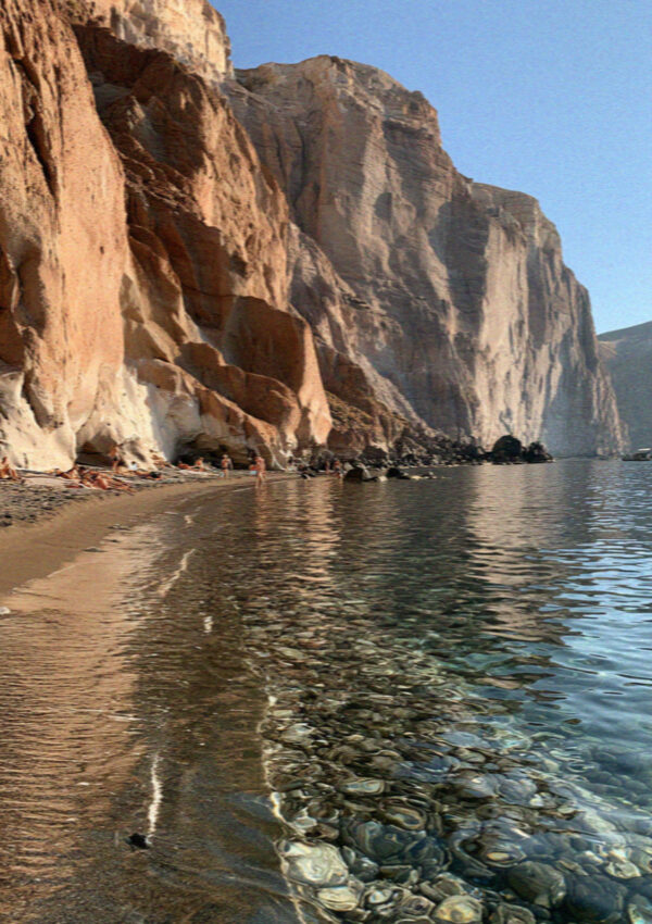 Black sand and red rock on the shore of Vulcano in the Aeolian Islands