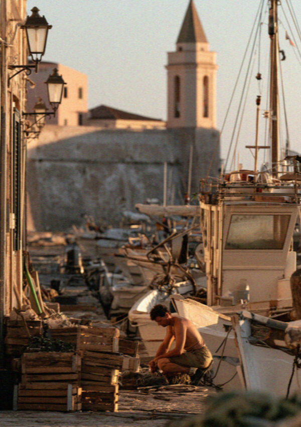 Fishing boats on the quay at Alghero after dawn