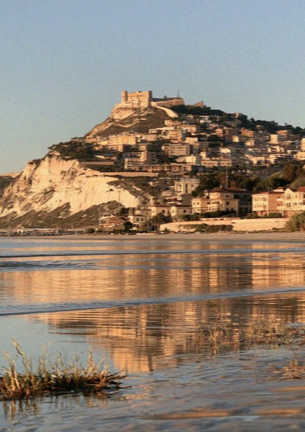 The limestone headland above Poetto seen from the water in Cagliari in Sardinia