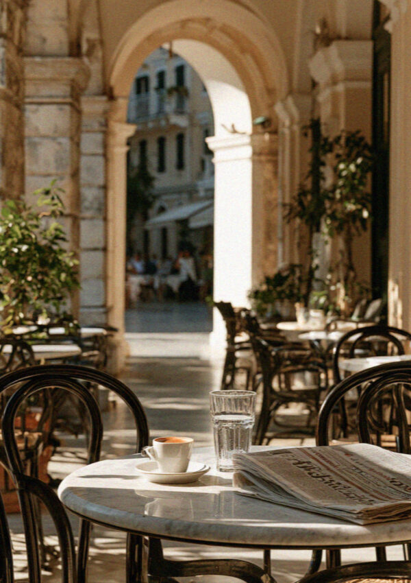 Coffee on a marble table under the arcade in Corfu Town in the Ionian islands