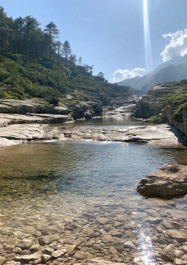 Clear granite river pools in the mountains of the Corsican interior