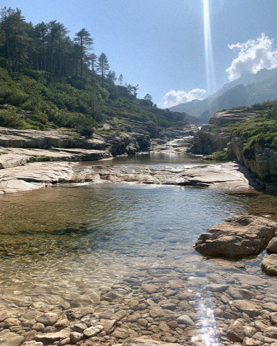 Clear granite river pools in the mountains of the Corsican interior