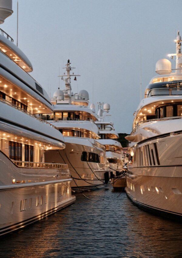 Yacht lights coming on at blue hour in Porto Cervo on the Costa Smeralda in Sardinia